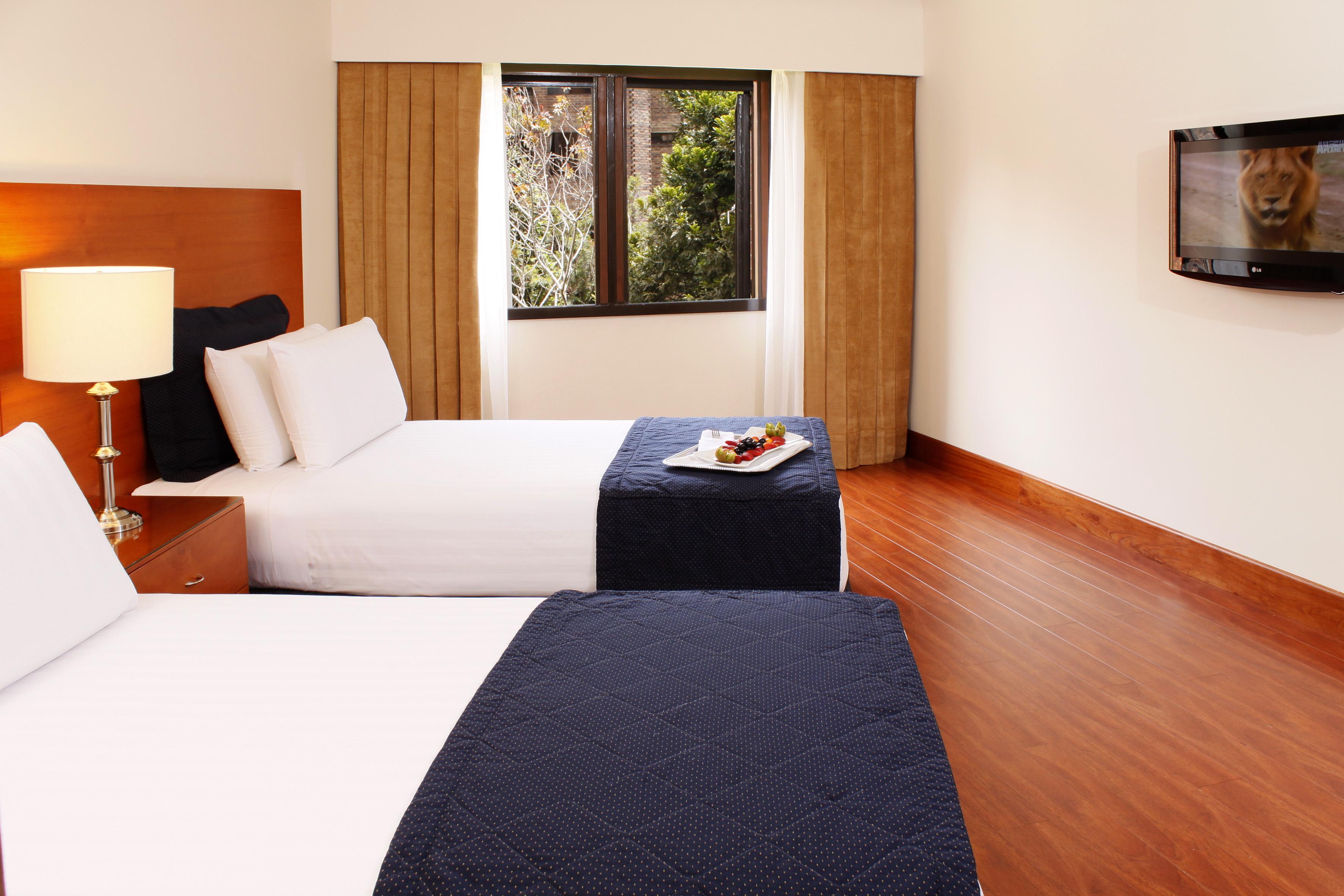 Hotel Estelar La Fontana Bogotá Kültér fotó A room at the hotel